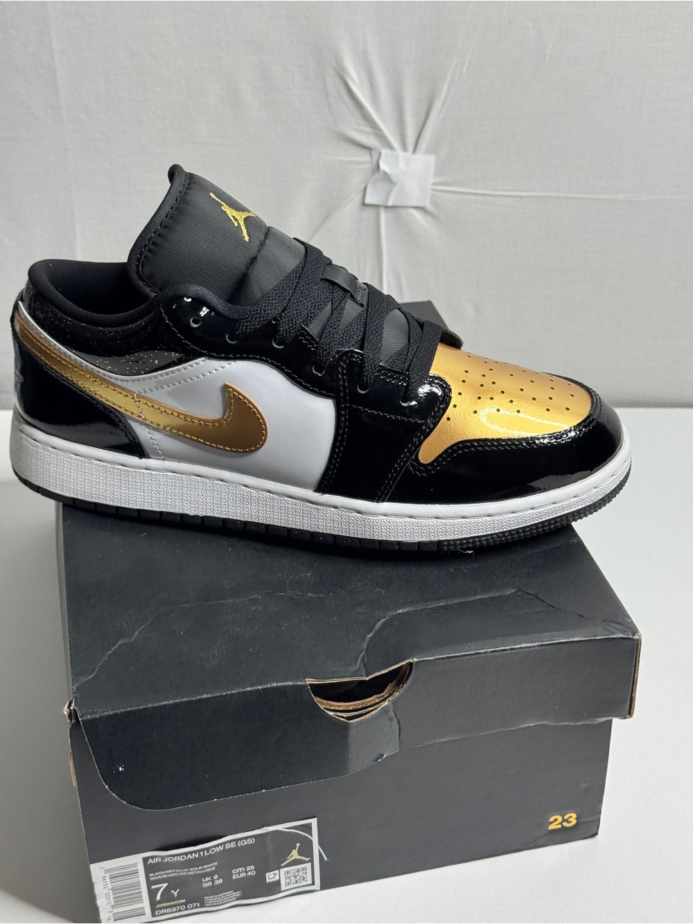 Jordan Kids Low Top Sneakers in Black, Gold & White